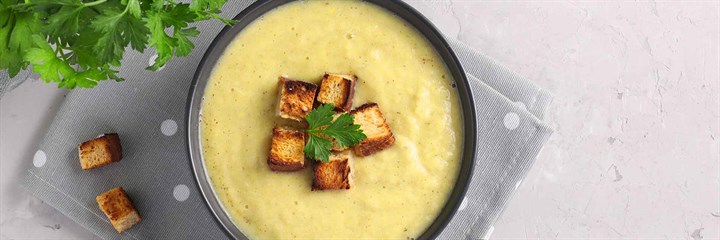 Creamy parsnip soup with parsnip chips