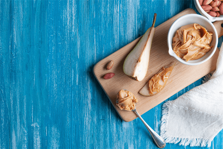 Sliced pear with nut butter