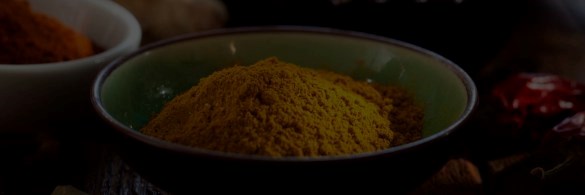 Powdered turmeric in a dish