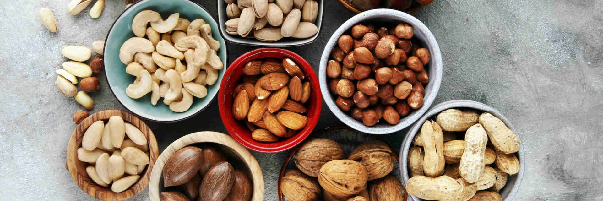 Selection of nuts in bowls