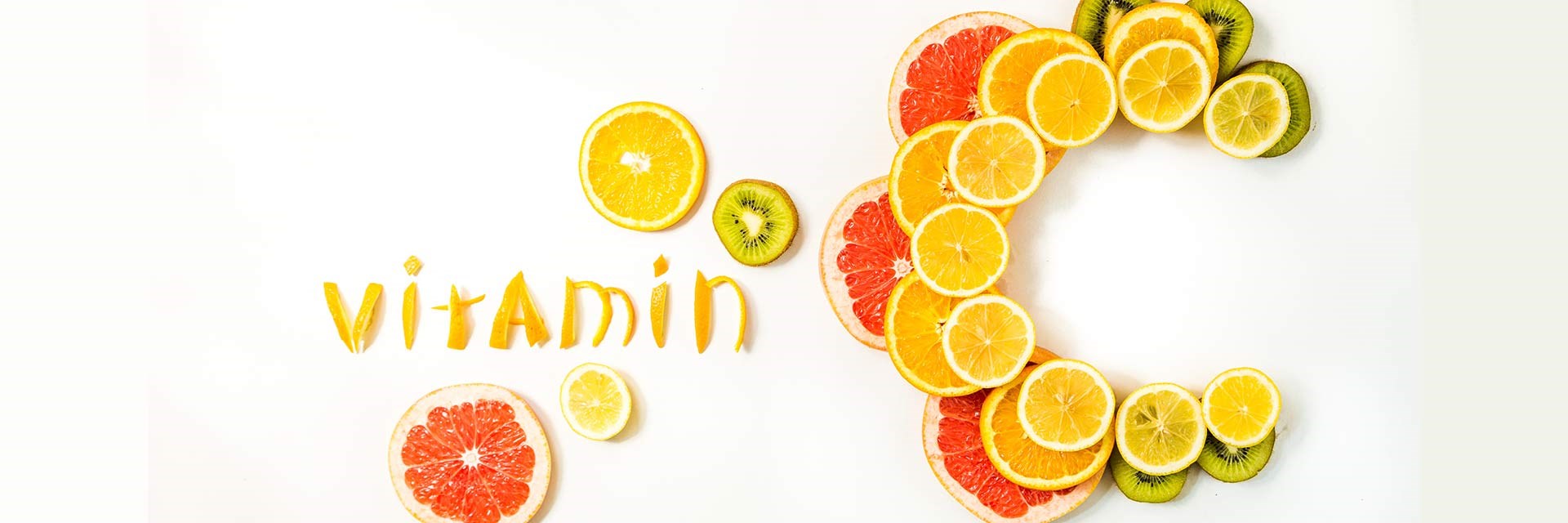 The word 'vitamin c' spelt out in citrus fruits