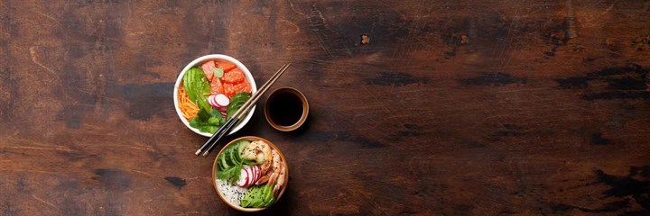 Bowl of food with chopsticks