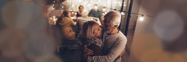Couple smiling and hugging