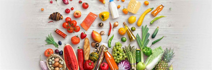 Top-down view of a rainbow of fruit and vegetables