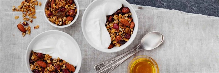 Yogurt and granola in bowls