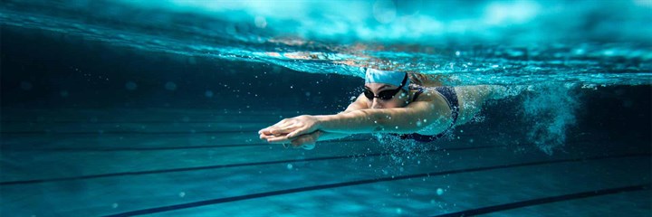 A person swimming underwater