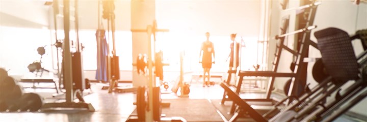 Gym equipment silhouetted in sunlight