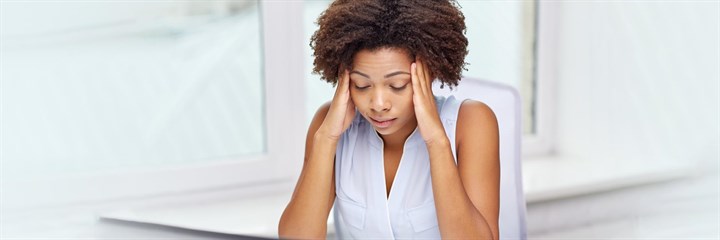 Image of a woman looking stressed
