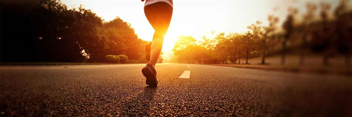 Person running at sunset