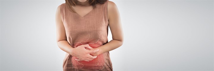 A woman holding her stomach