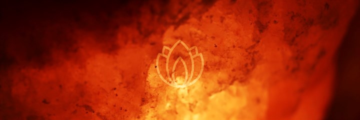 Ayurveda pitta symbol on fiery background