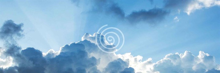 Vata symbol on cloudy background