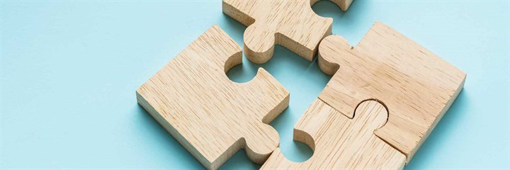 Jigsaw pieces on a blue background