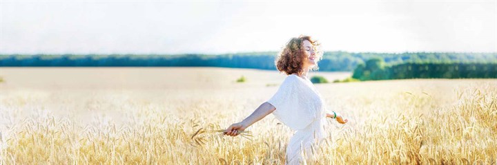 Woman in a corn field