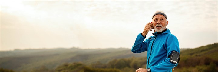 Older man running in the countryside