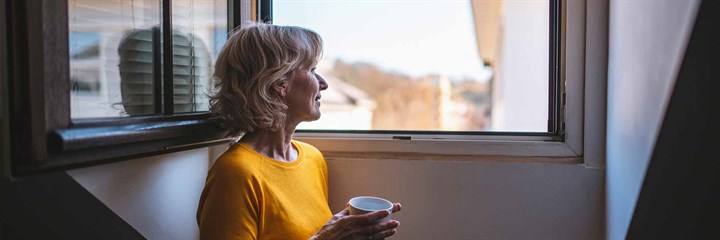 Woman looking out of the window