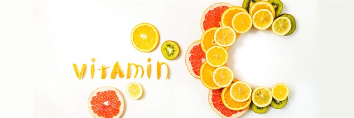 The word 'vitamin c' spelt out in citrus fruits