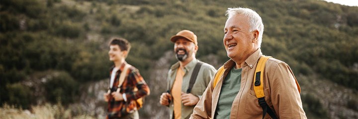 Three generations of men going for a ramble