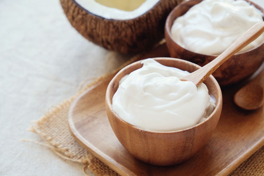 Probiotic yoghurt in wooden bowl